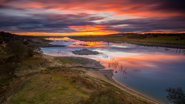 Sunset river island boats cityscape free wallpaper for desktop - medium preview image
