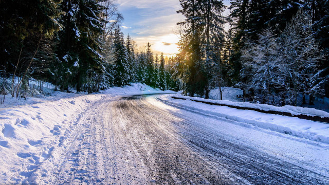 Snowy road car trees sunset free wallpaper for desktop - medium preview image