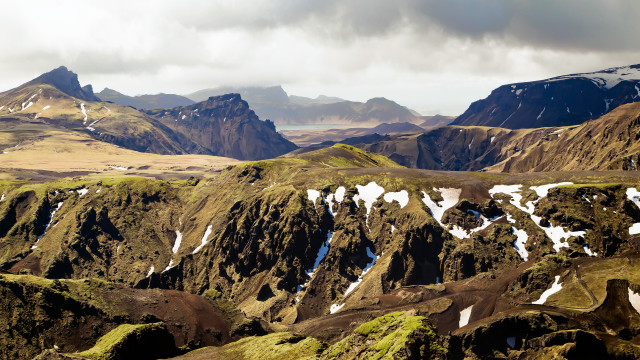 Mountain snow green cliffs cloudy free wallpaper for desktop - medium preview image