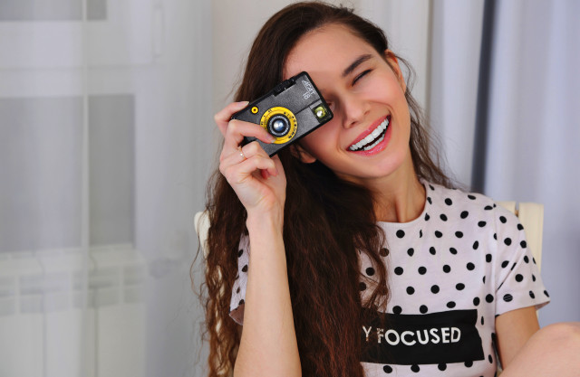 Woman smiling polaroid lomography eskter free wallpaper for desktop - medium preview image