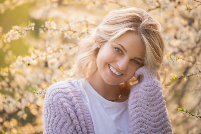 Smiling woman cherry blossoms outdoors free wallpaper for desktop - medium preview image