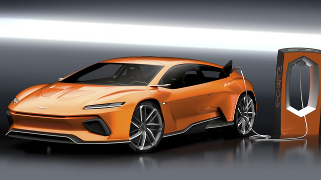 Futuristic orange car charging dark free wallpaper for desktop - medium preview image