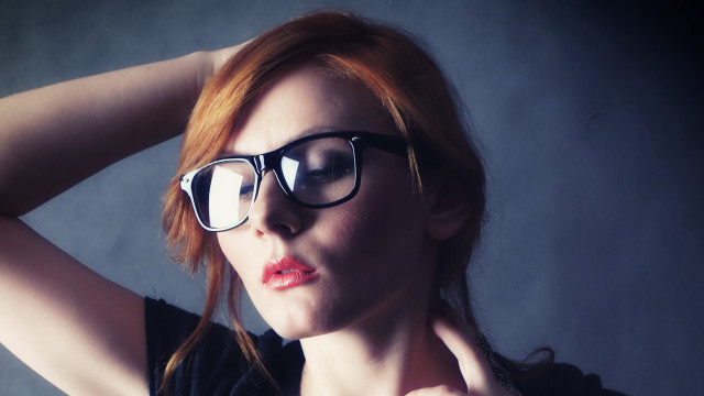 Woman glasses black shirt portrait free wallpaper for desktop - medium preview image