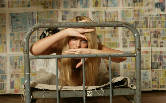Woman bed cage newspaper urban free wallpaper for desktop - medium preview image