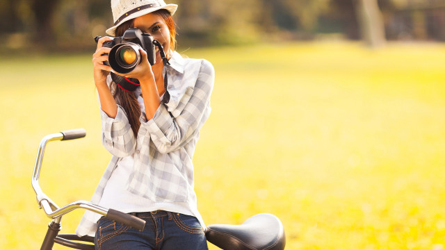 Woman biking self portrait field #2 free wallpaper for desktop - medium preview image