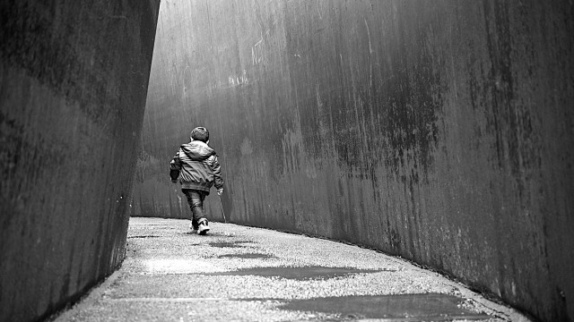 Person walking sidewalk wall sky free wallpaper for desktop - medium preview image