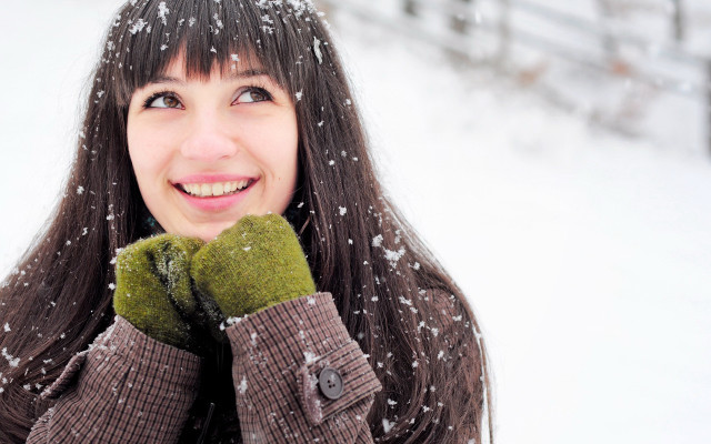 Woman smiling snow winter brownjacket free wallpaper for desktop - medium preview image