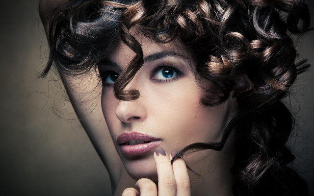 Curly haired blue eyed portrait free wallpaper for desktop - medium preview image