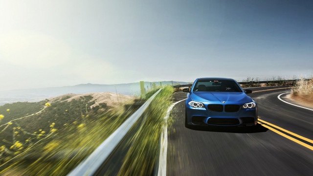 Blue car hillside fenced mountain free wallpaper for desktop - medium preview image