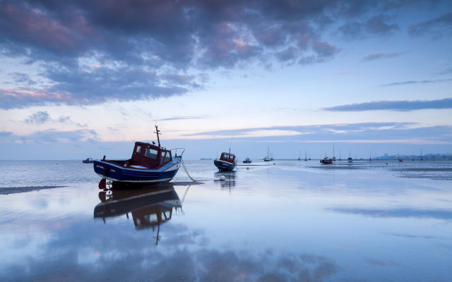 Boats beach water sky clouds free wallpaper for desktop - medium preview image