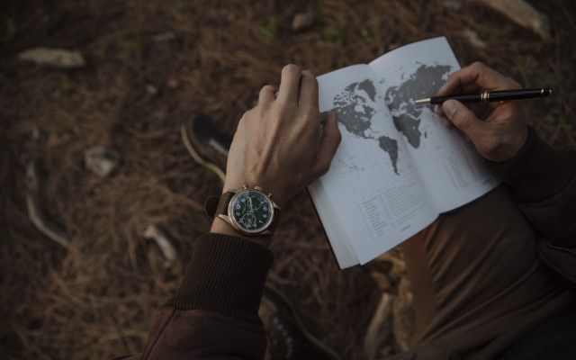 Person holding pen book writing free wallpaper for desktop - medium preview image