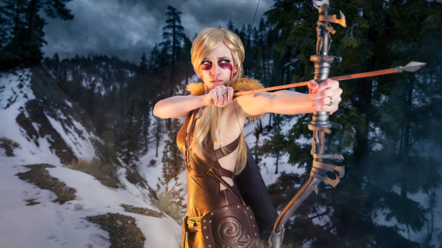 Woman archer snowy mountains portrait free wallpaper for desktop - medium preview image