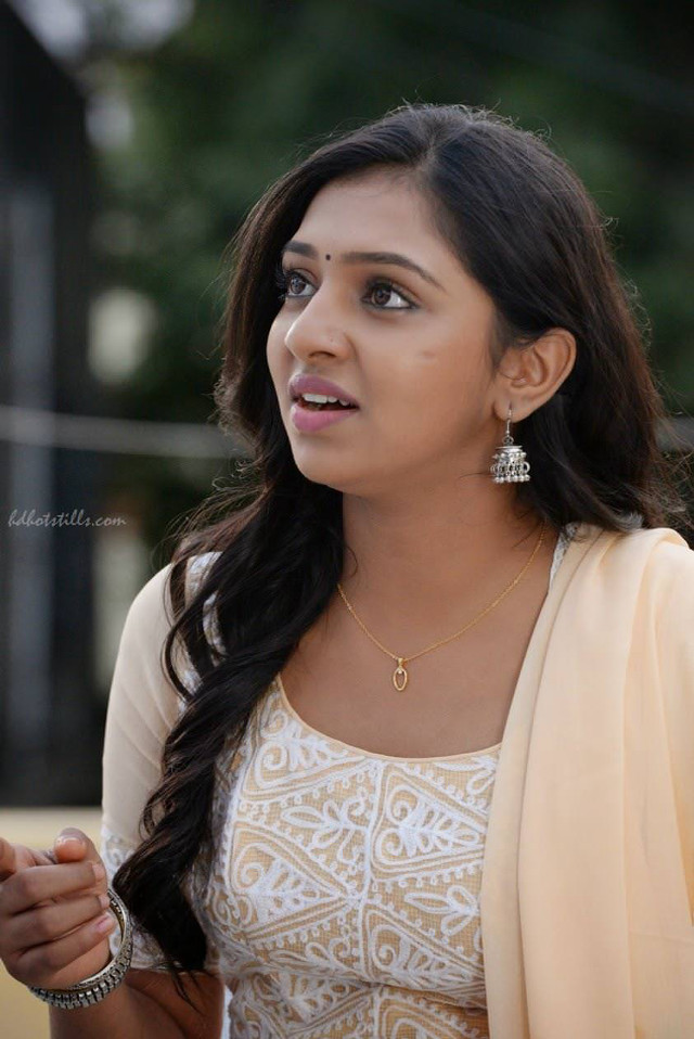 Woman white dress yellow jacket free wallpaper for mobile - medium preview image