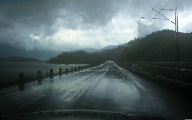 Gloomy road water power lines free wallpaper for desktop - medium preview image