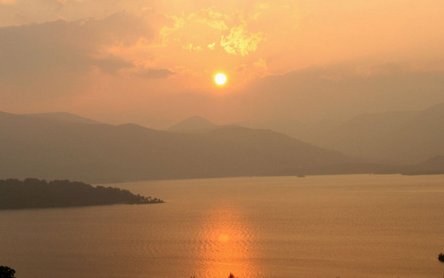 Sunset lake mountain bird horizon free wallpaper for desktop - medium preview image