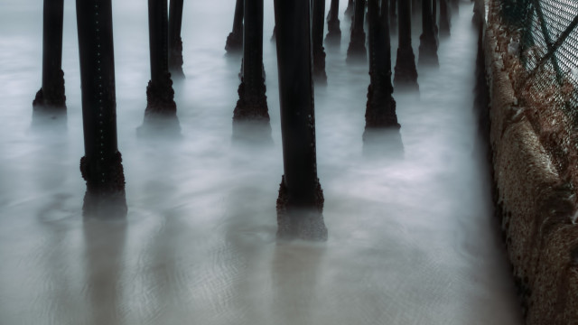 Pier fence bird cloud mountain free wallpaper for desktop - medium preview image