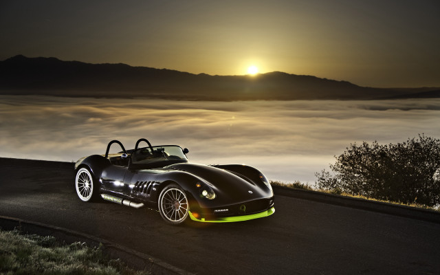 Black sports car sunset fog free wallpaper for desktop - medium preview image