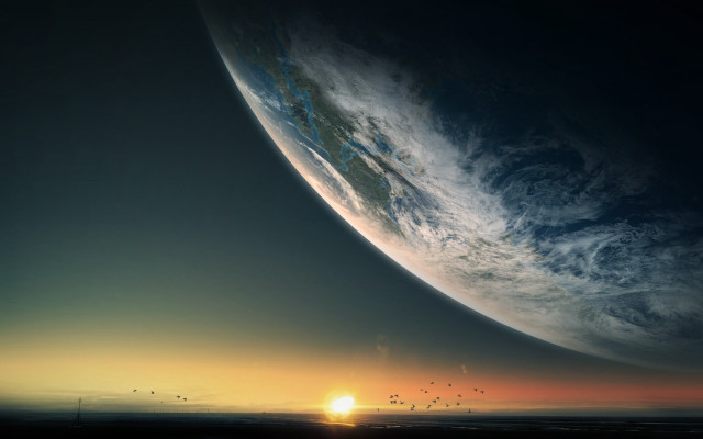 Large planet sunset horizon ocean free wallpaper for desktop - medium preview image