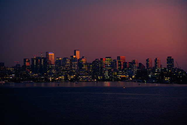 Cityscape night redsky boat water free wallpaper for desktop - medium preview image