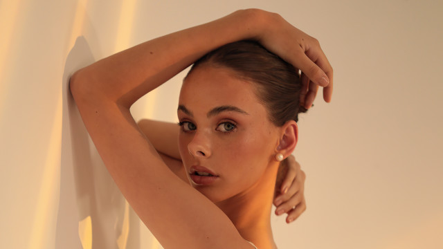 Woman ponytail white dress portrait free wallpaper for desktop - medium preview image