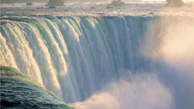 Waterfall boat mountain sunset sky free wallpaper for desktop - medium preview image