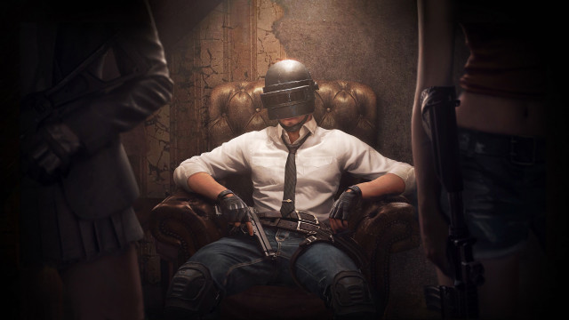 Man sitting gun helmet portrait free wallpaper for desktop - medium preview image