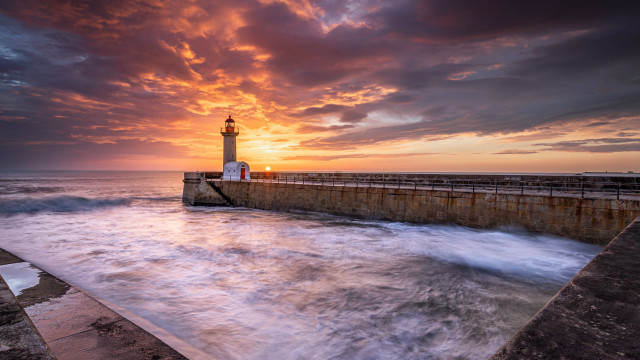 Lighthouse pier sunset waves water free wallpaper for desktop - medium preview image
