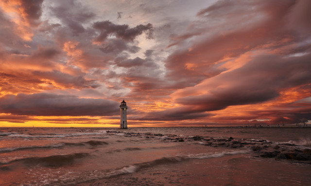 Lighthouse beach sunset clouds water free wallpaper for desktop - medium preview image