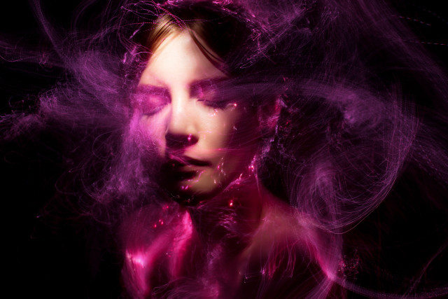 Woman blowing hair pink smoke free wallpaper for desktop - medium preview image