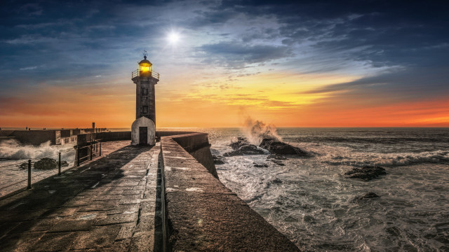 Lighthouse pier waves sunset radiant free wallpaper for desktop - medium preview image
