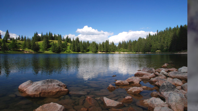 Lake rocks trees sky clouds free wallpaper for desktop - medium preview image