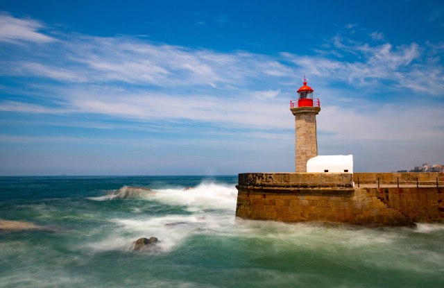 Lighthouse ocean waves saturated sky free wallpaper for desktop - medium preview image