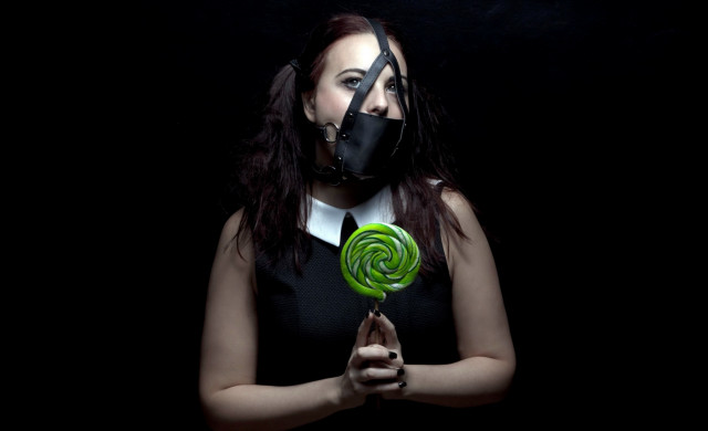 Woman gasmask lollipop transgressive portrait free wallpaper for desktop - medium preview image