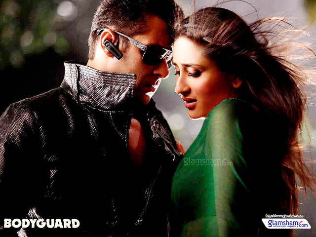 Man woman talking cell phones free wallpaper for desktop - medium preview image