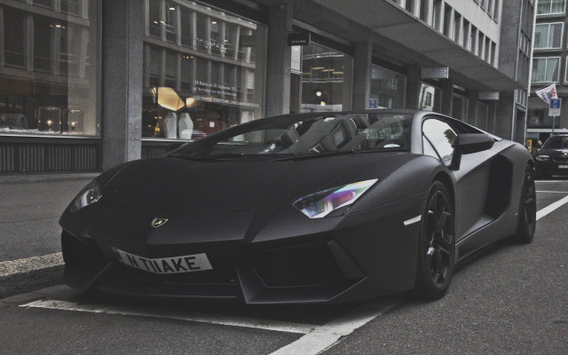 Black sports car road building free wallpaper for desktop - medium preview image