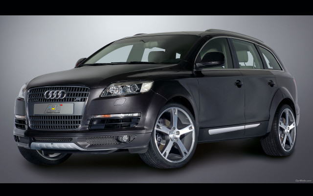 Black car studio gray background free wallpaper for desktop - medium preview image