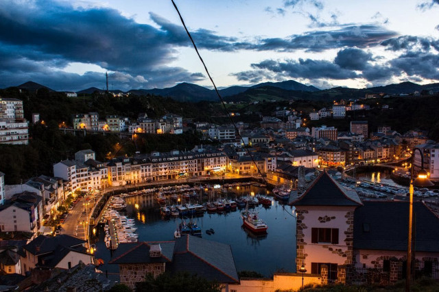 Harbor boats buildings night cloudy free wallpaper for desktop - medium preview image