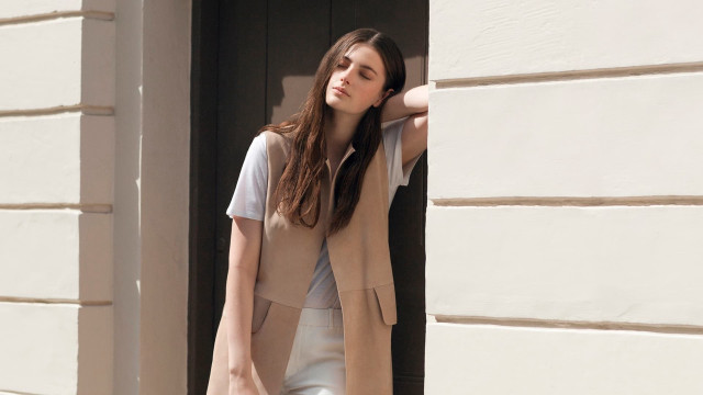 Woman looking window building hand free wallpaper for desktop - medium preview image