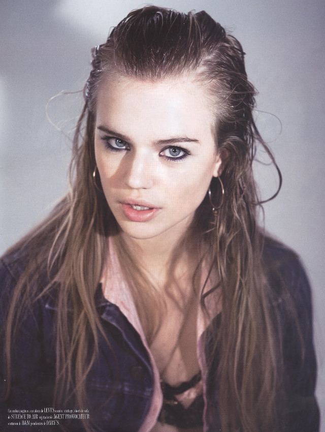 Woman long hair serious pose free wallpaper for mobile - medium preview image