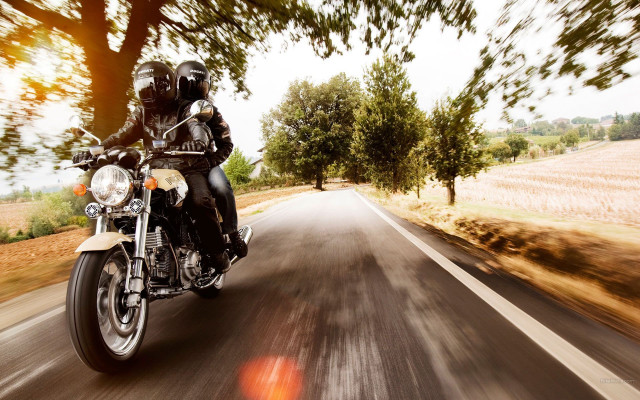 Man motorcycle country road grass free wallpaper for desktop - medium preview image