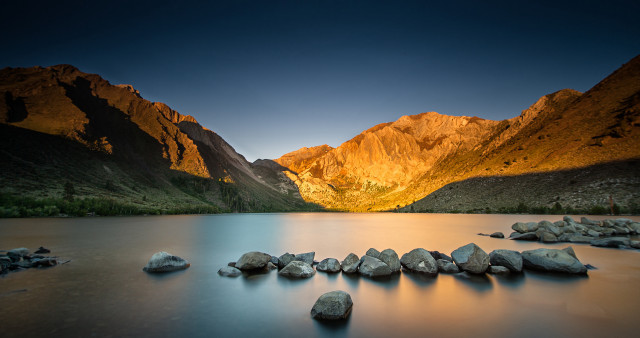 Lake mountains rocks water scenery free wallpaper for desktop - medium preview image