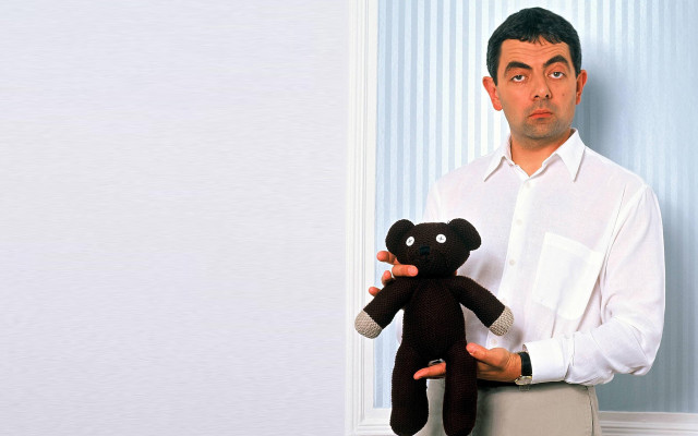 Man holding teddy bear surprised free wallpaper for desktop - medium preview image