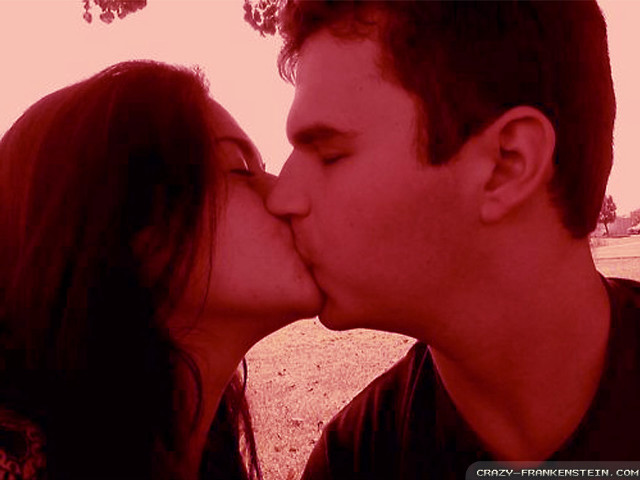 Man woman kissing park red free wallpaper for desktop - medium preview image