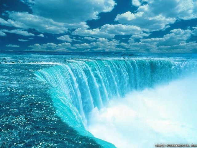 Waterfall ocean blue sky clouds free wallpaper for desktop - medium preview image