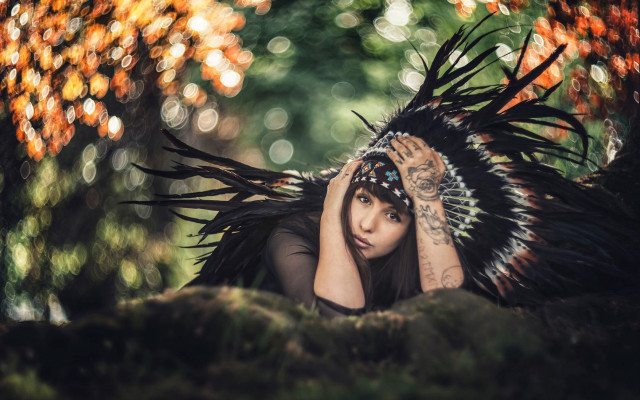 Woman headdress feathers rock woods free wallpaper for desktop - medium preview image