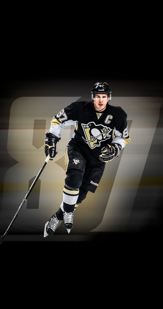 Hockey player running puck number free wallpaper for mobile - medium preview image