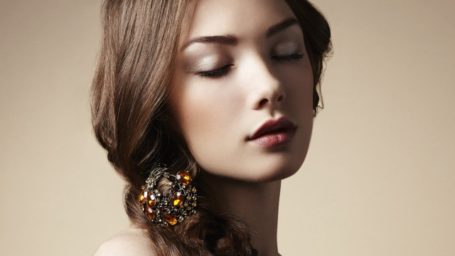 Woman braid earrings closed eyes free wallpaper for desktop - medium preview image