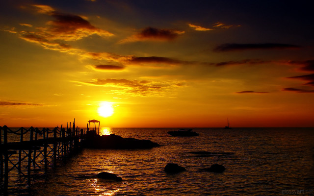 Sunset water pier boats clouds free wallpaper for desktop - medium preview image