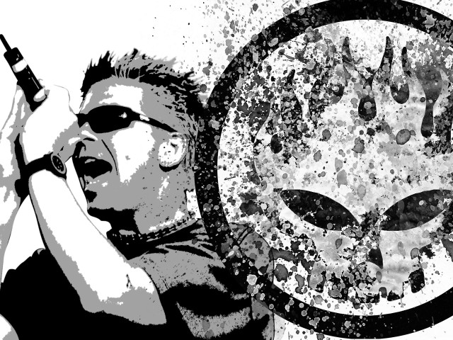 Man holding cell phone alien free wallpaper for desktop - medium preview image