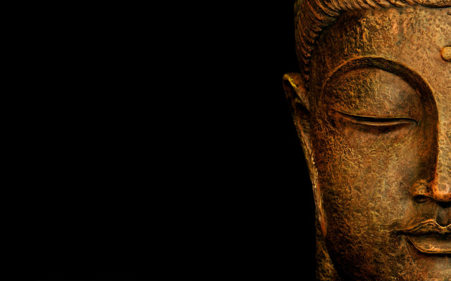 Buddha statue closeup black background free wallpaper for desktop - medium preview image